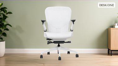 White ergonomic office chair with breathable mesh back and adjustable armrests.